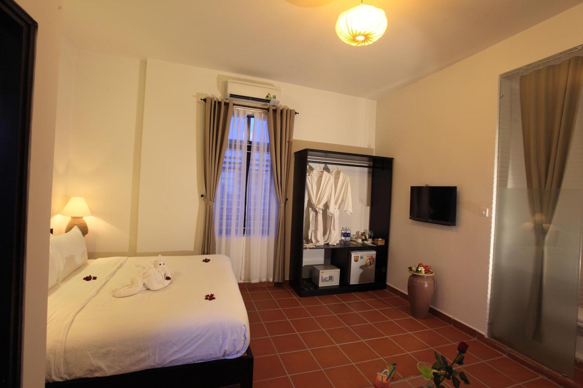 East West Villa Hoi An Rom bilde