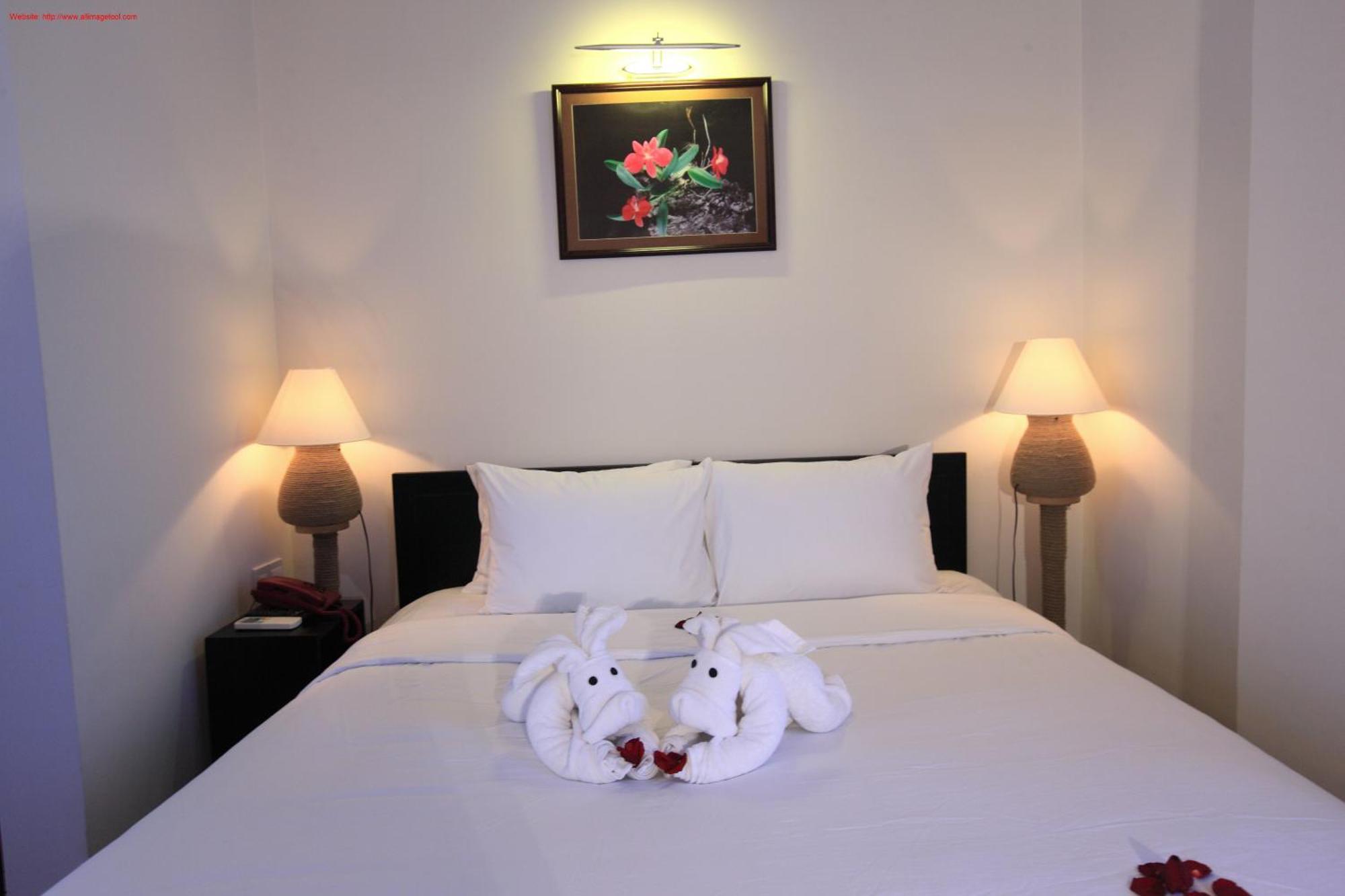 East West Villa Hoi An Rom bilde